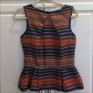 Fabulous Brit Ryan peplum tip